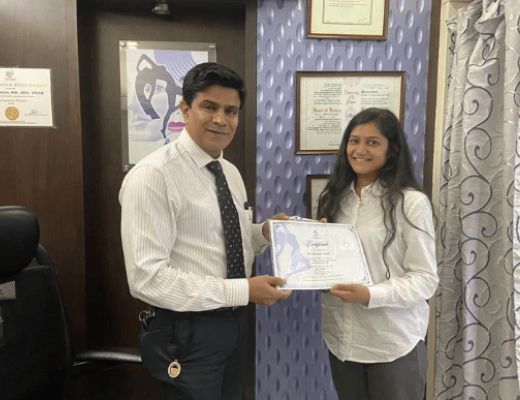 Dr. Ashish provideing certificate